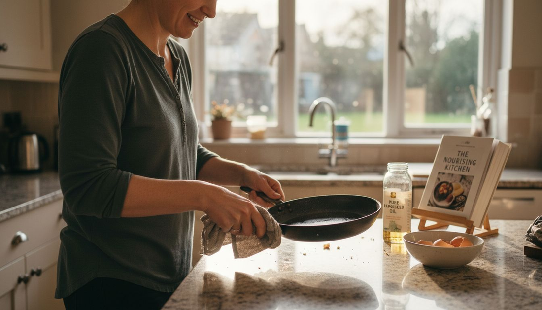 Cook cleaning seasoned carbon steel pan