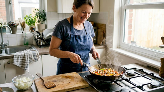 Home cook using seasoned carbon steel pan